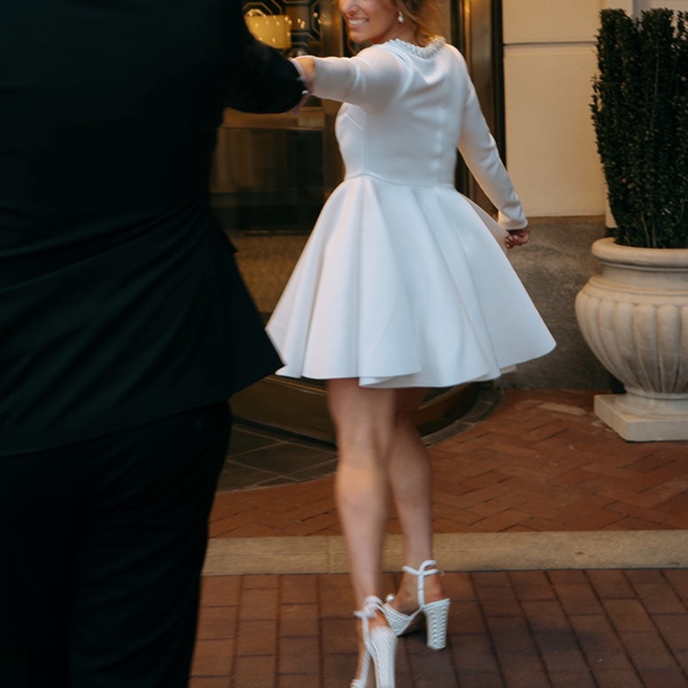 Short & classy engagement dress with a pearl embellished square neckline